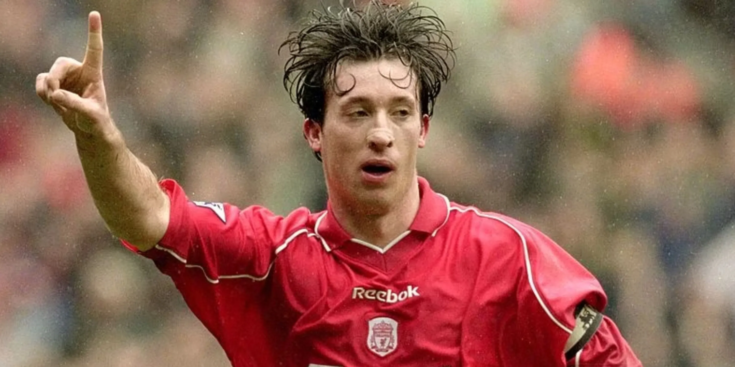 Tiền đạo Robbie Fowler ăn mừng bàn thắng cho Liverpool
